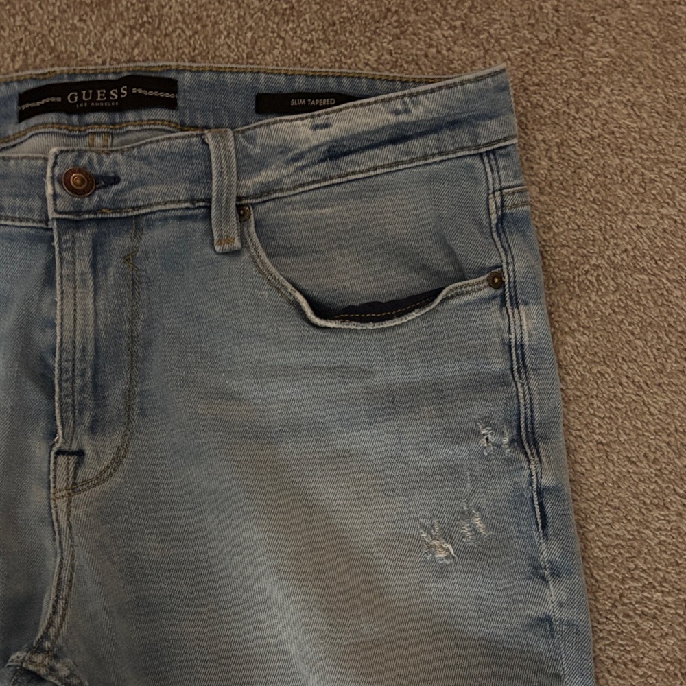 Guess Men's Slim Tapered Distressed Jeans in Faded Blue Wash - Picture 5 of 9
